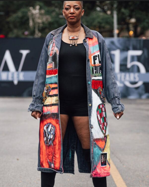 Model on runway wearing Raindrop Sunshine pendant necklace