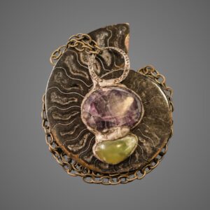 Serpentine and purple fluorite pendant