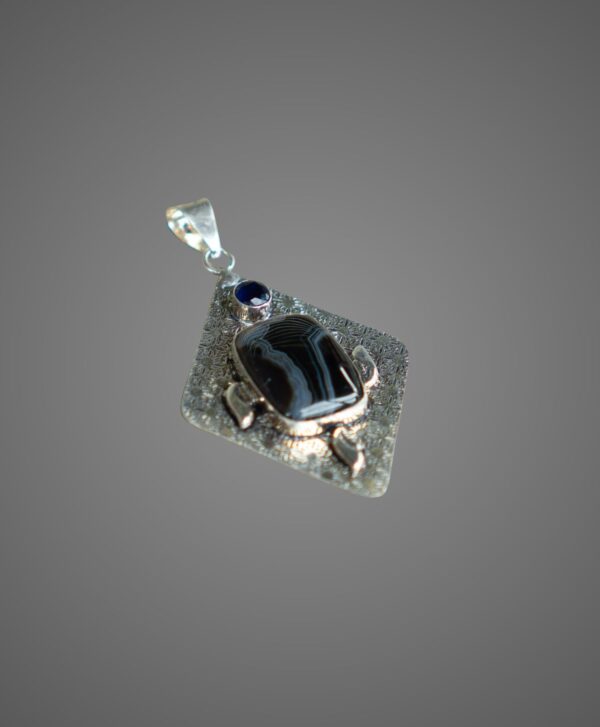 black onyx and obsidian pendant side view